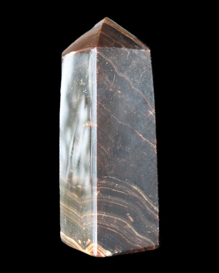 Chocolate Calcite obelisk 105*35*32mm 295g in sunlight - Rocks and Things Store