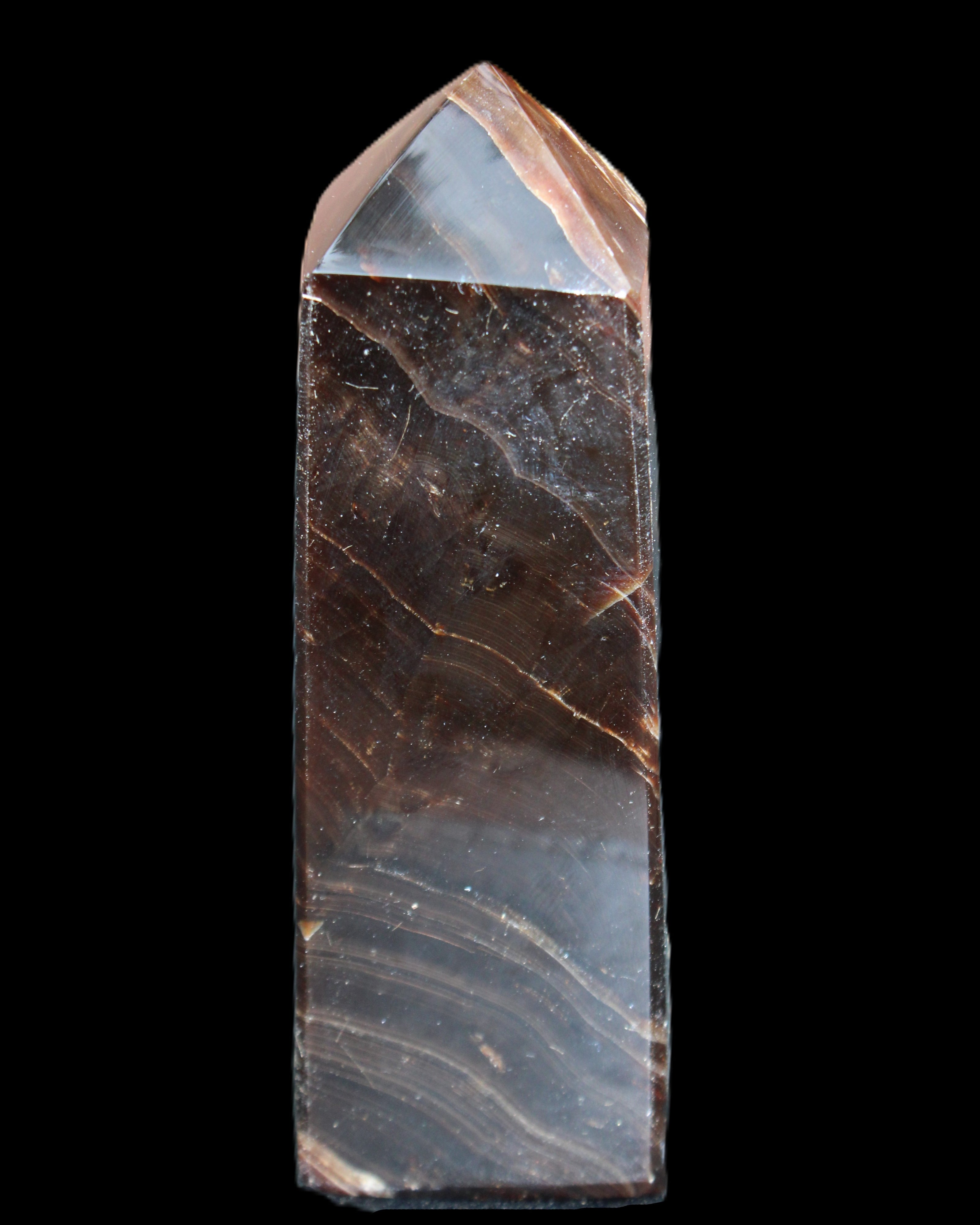 Chocolate Calcite obelisk 105*35*32mm 295g in sunlight - Rocks and Things Store