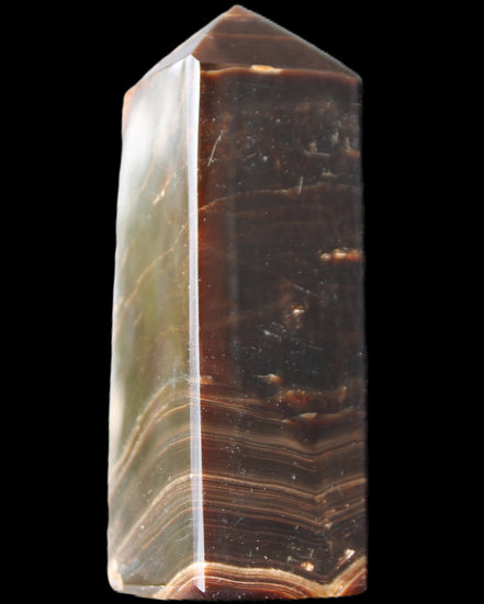 Chocolate Calcite obelisk 105*35*32mm 295g in sunlight - Rocks and Things Store