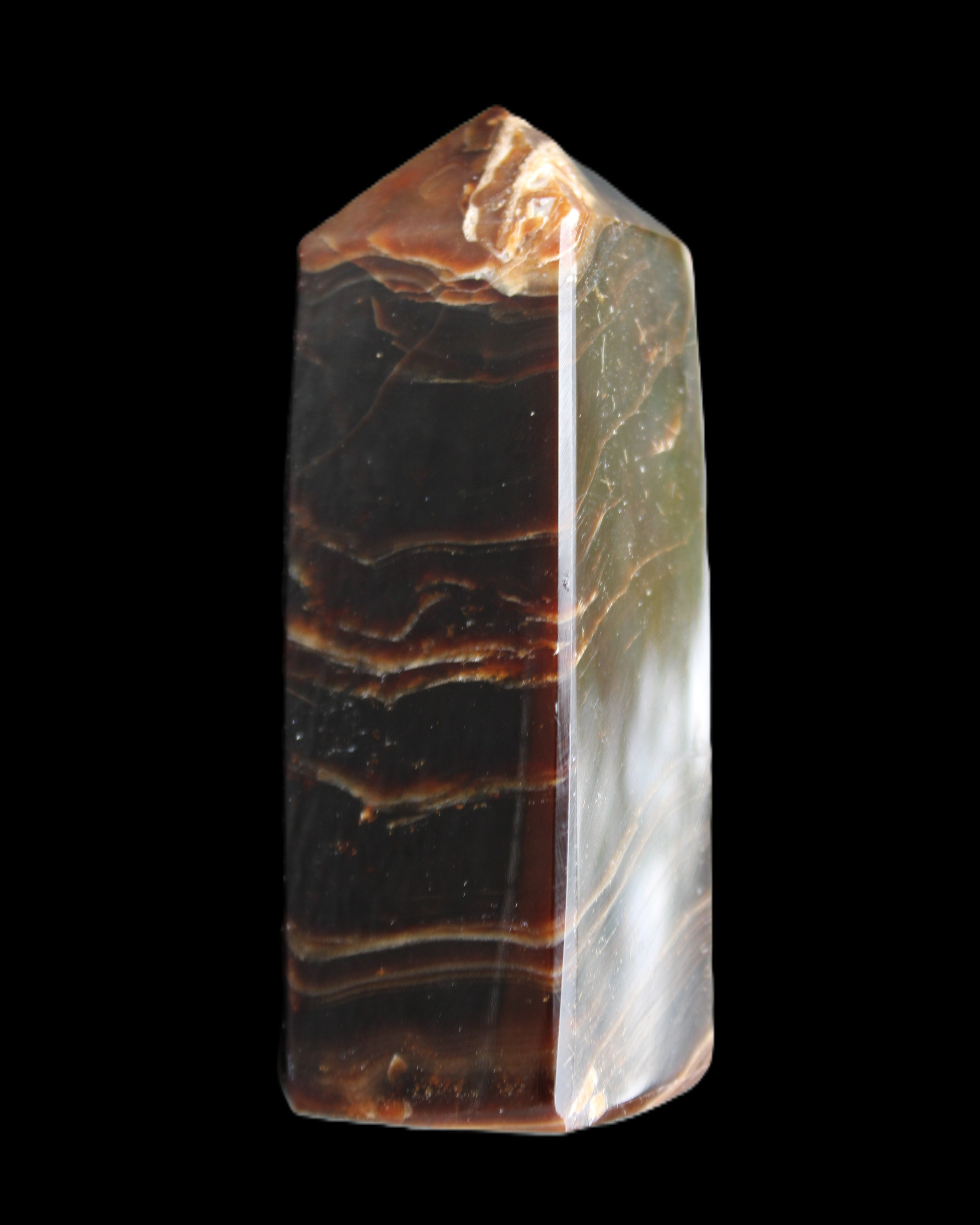 Chocolate Calcite obelisk 105*35*32mm 295g in sunlight - Rocks and Things Store