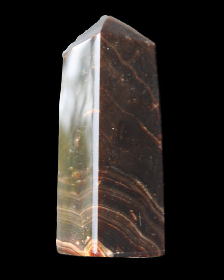 Chocolate Calcite obelisk 105*35*32mm 295g in sunlight - Rocks and Things Store