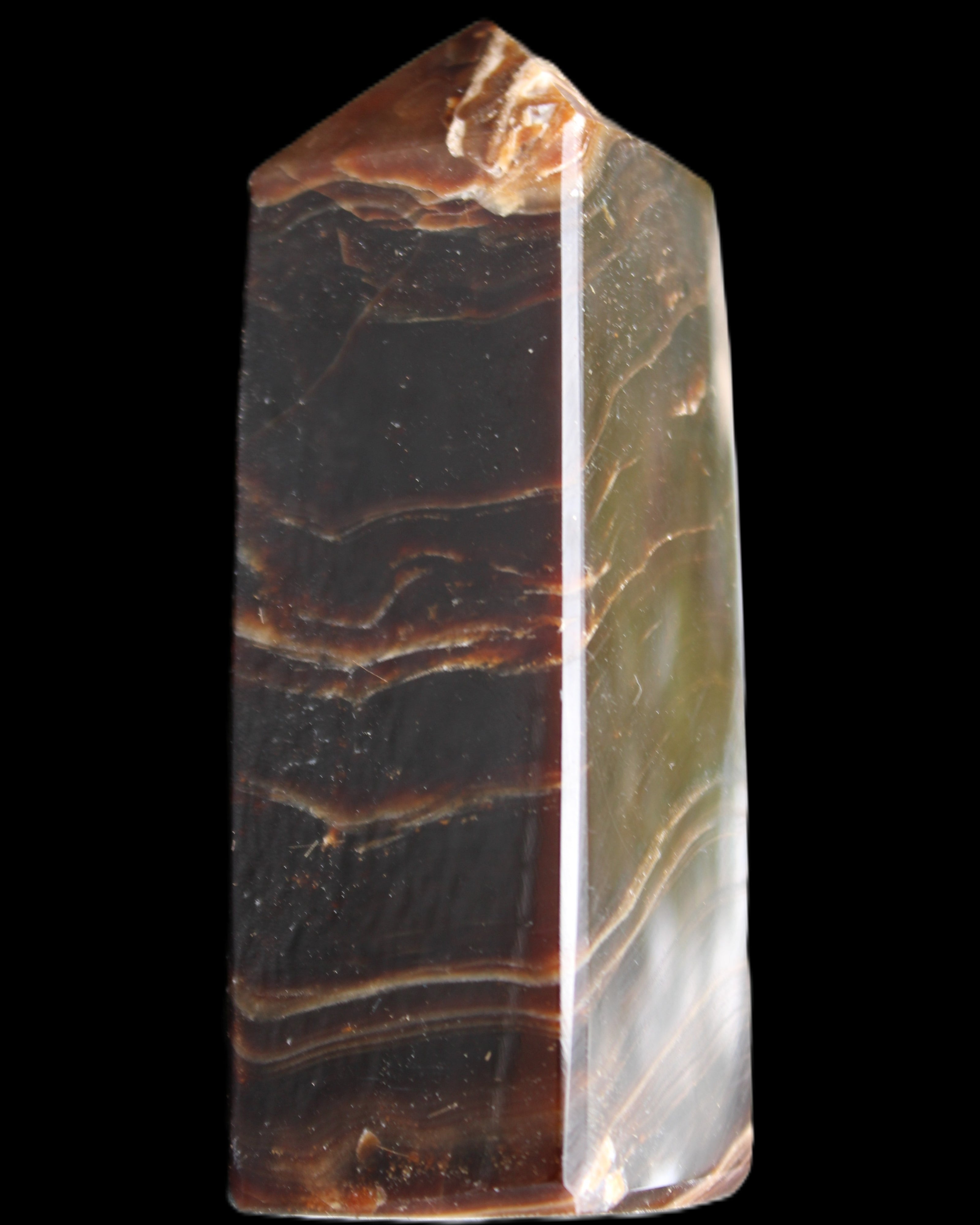 Chocolate Calcite obelisk 105*35*32mm 295g in sunlight - Rocks and Things Store
