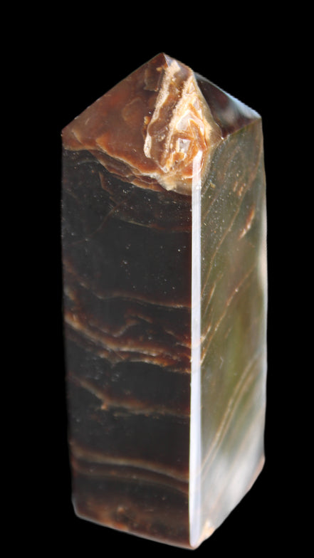 Chocolate Calcite obelisk 105*35*32mm 295g in sunlight - Rocks and Things Store