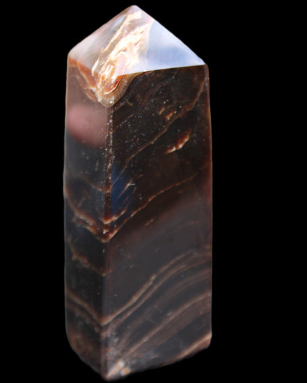 Chocolate Calcite obelisk 105*35*32mm 295g in sunlight - Rocks and Things Store