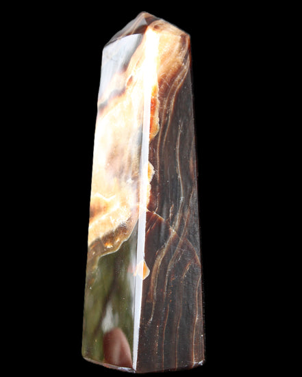 Chocolate Calcite obelisk 112*33*26mm 203g in sunlight - Rocks and Things Store
