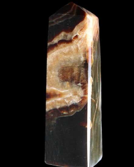 Chocolate Calcite obelisk 112*33*26mm 203g in sunlight - Rocks and Things Store
