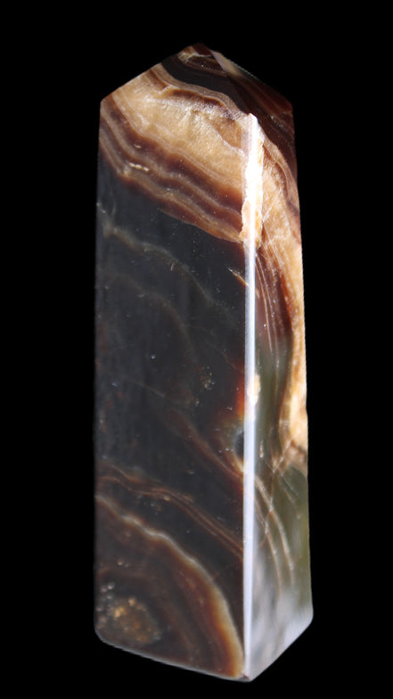 Chocolate Calcite obelisk 112*33*26mm 203g in sunlight - Rocks and Things Store