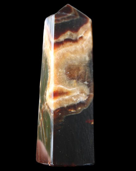 Chocolate Calcite obelisk 112*33*26mm 203g in sunlight - Rocks and Things Store