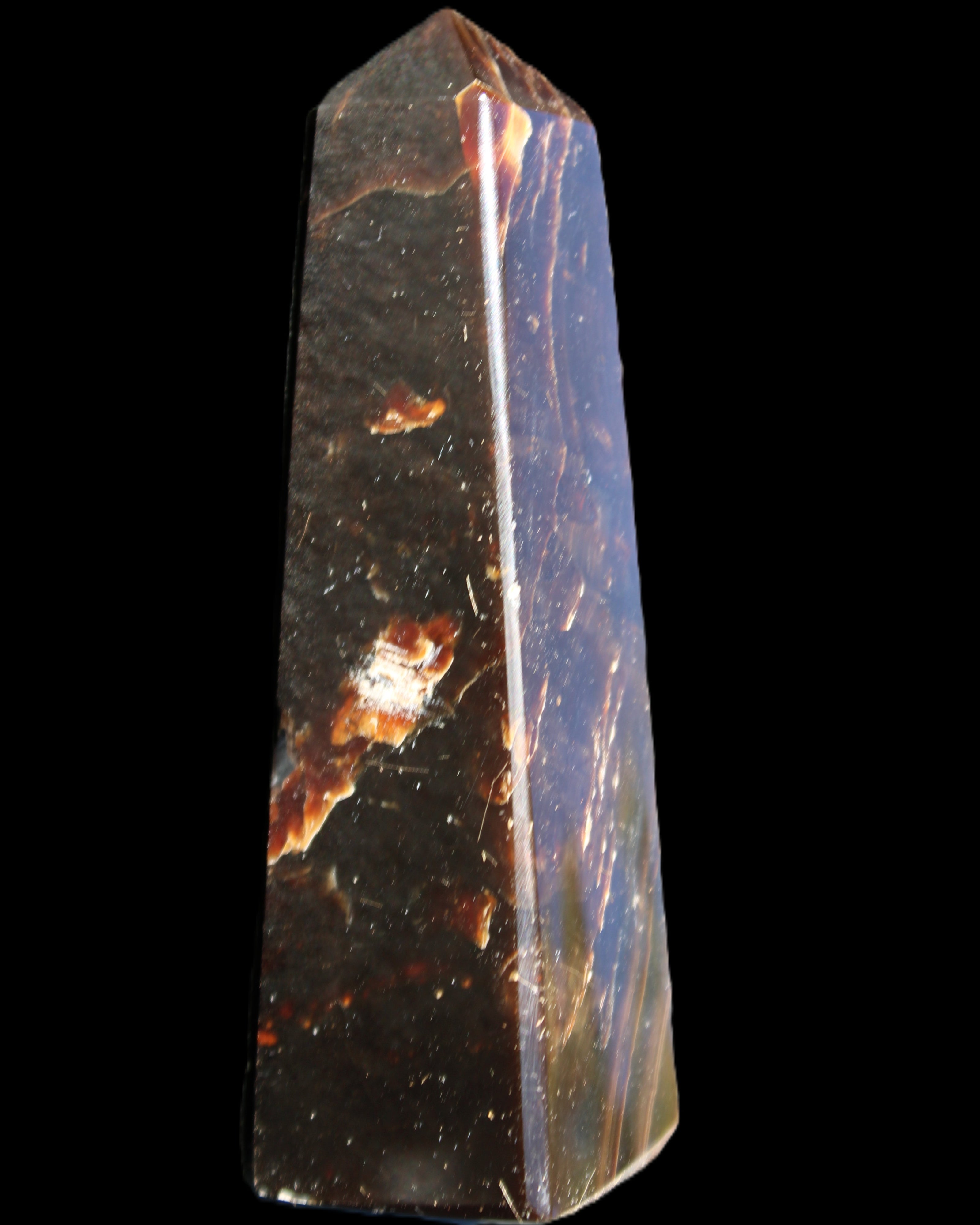 Chocolate Calcite obelisk 110*32*27mm 187g in sunlight - Rocks and Things Store