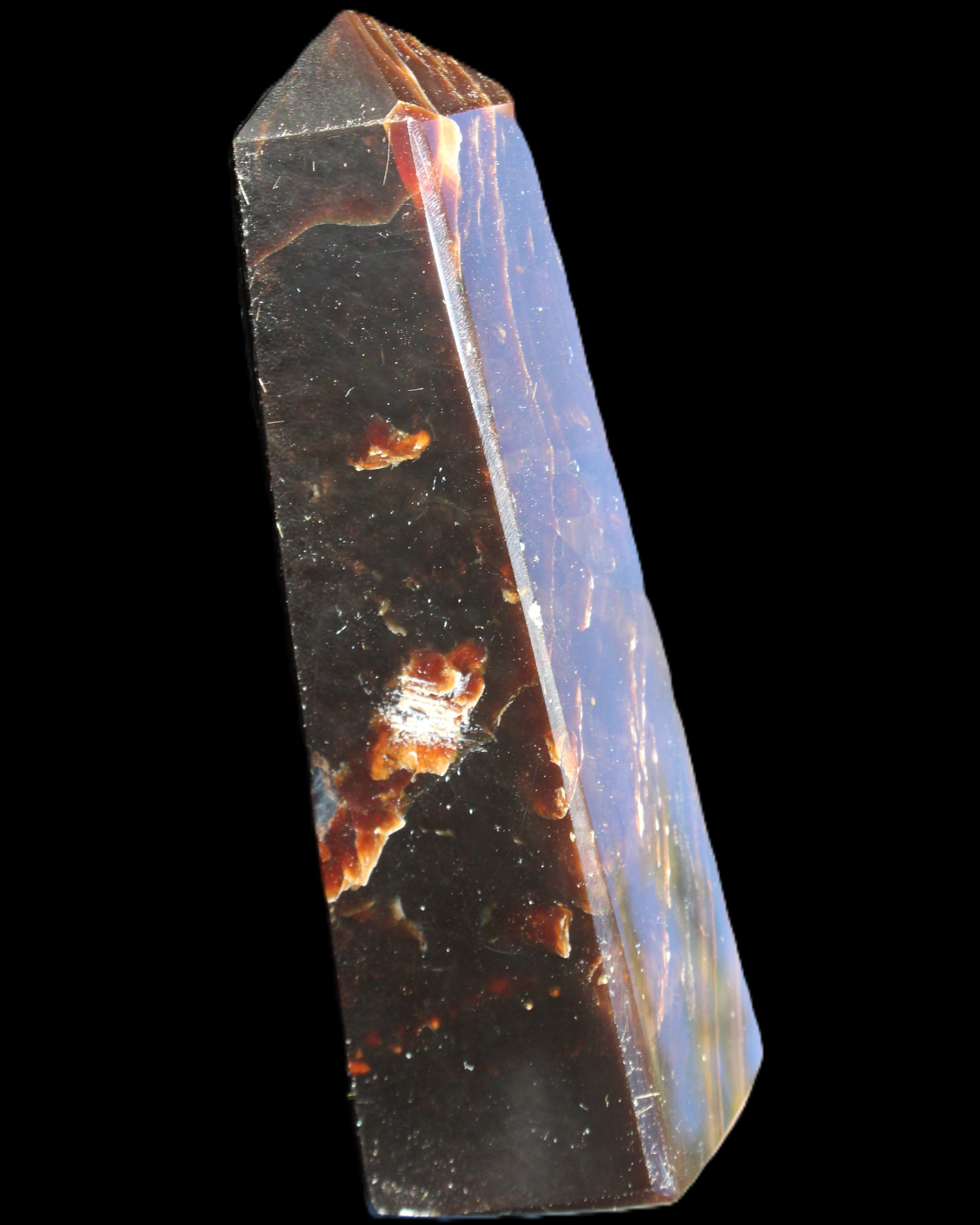 Chocolate Calcite obelisk 110*32*27mm 187g in sunlight - Rocks and Things Store