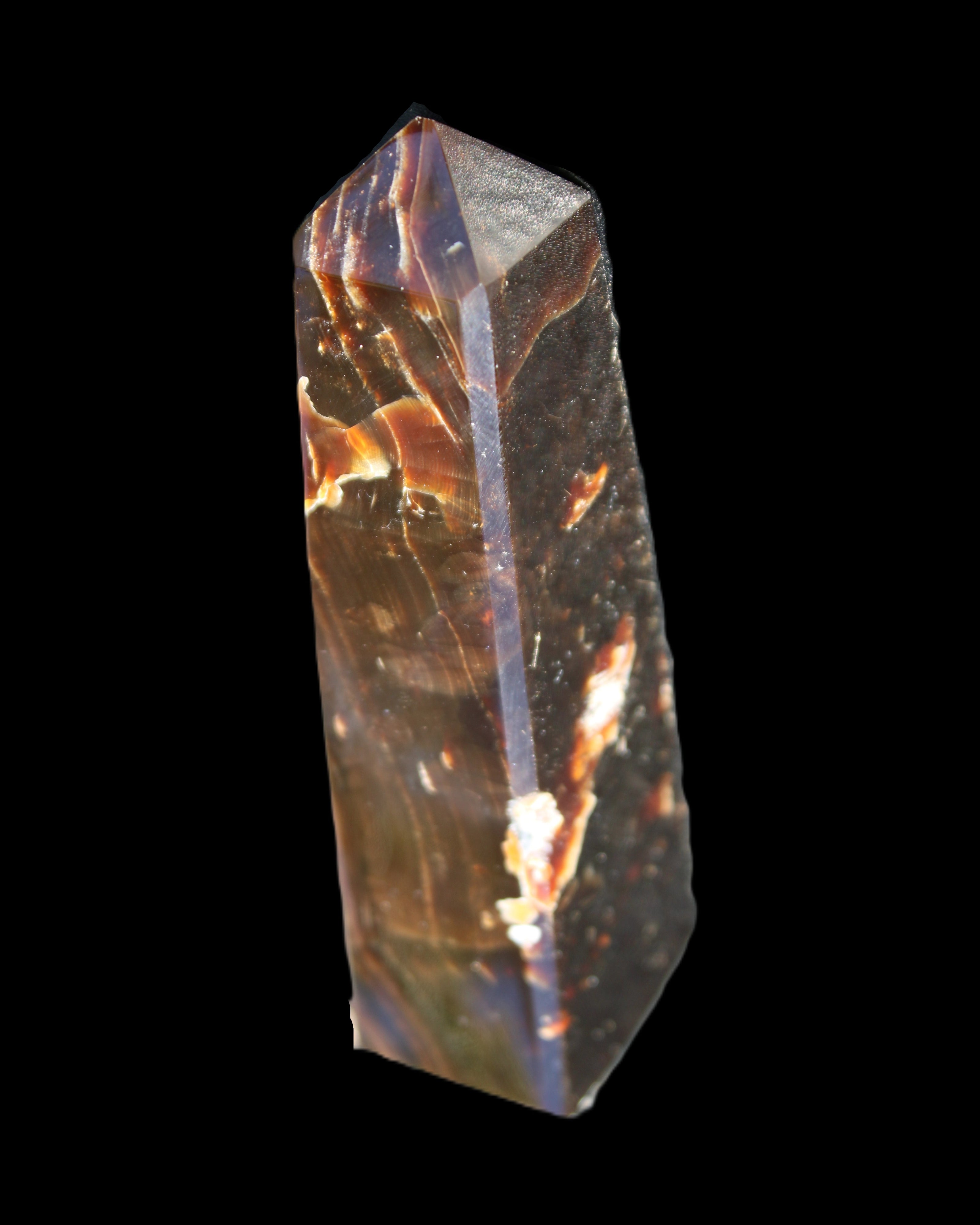 Chocolate Calcite obelisk 110*32*27mm 187g in sunlight - Rocks and Things Store