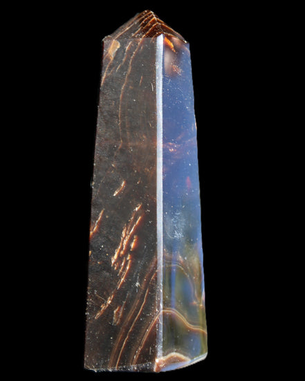 Chocolate Calcite obelisk 110*32*27mm 187g in sunlight - Rocks and Things Store