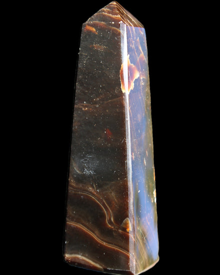 Chocolate Calcite obelisk 110*32*27mm 187g in sunlight - Rocks and Things Store