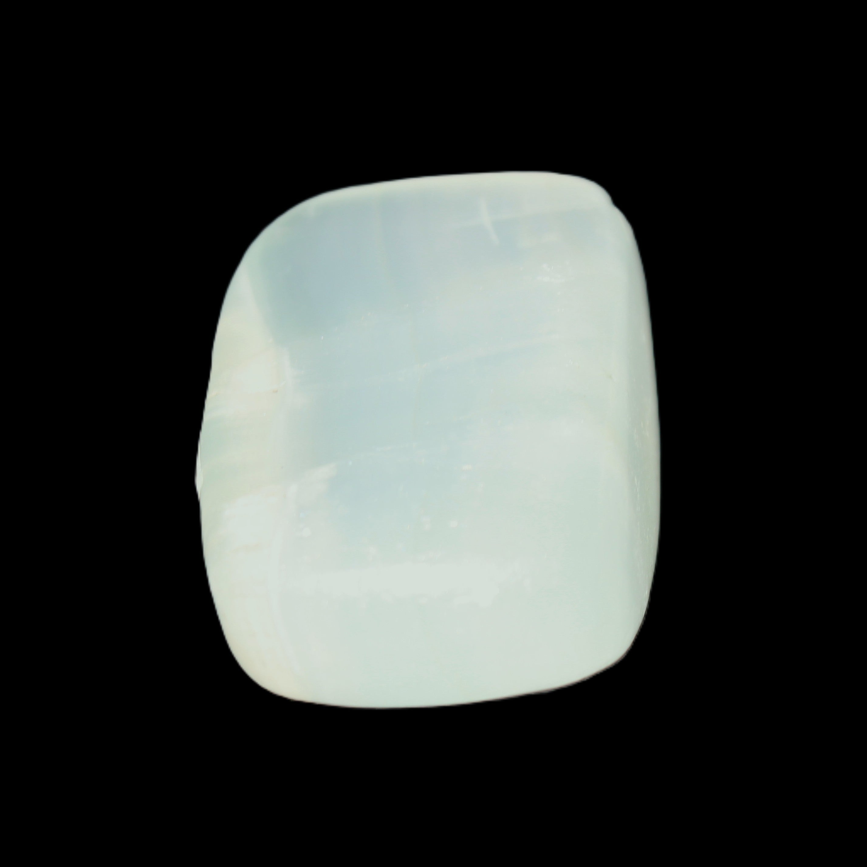 Pistachio Calcite tumbled stone 30-37mm 21-29g in sunlight - Rocks and Things Store