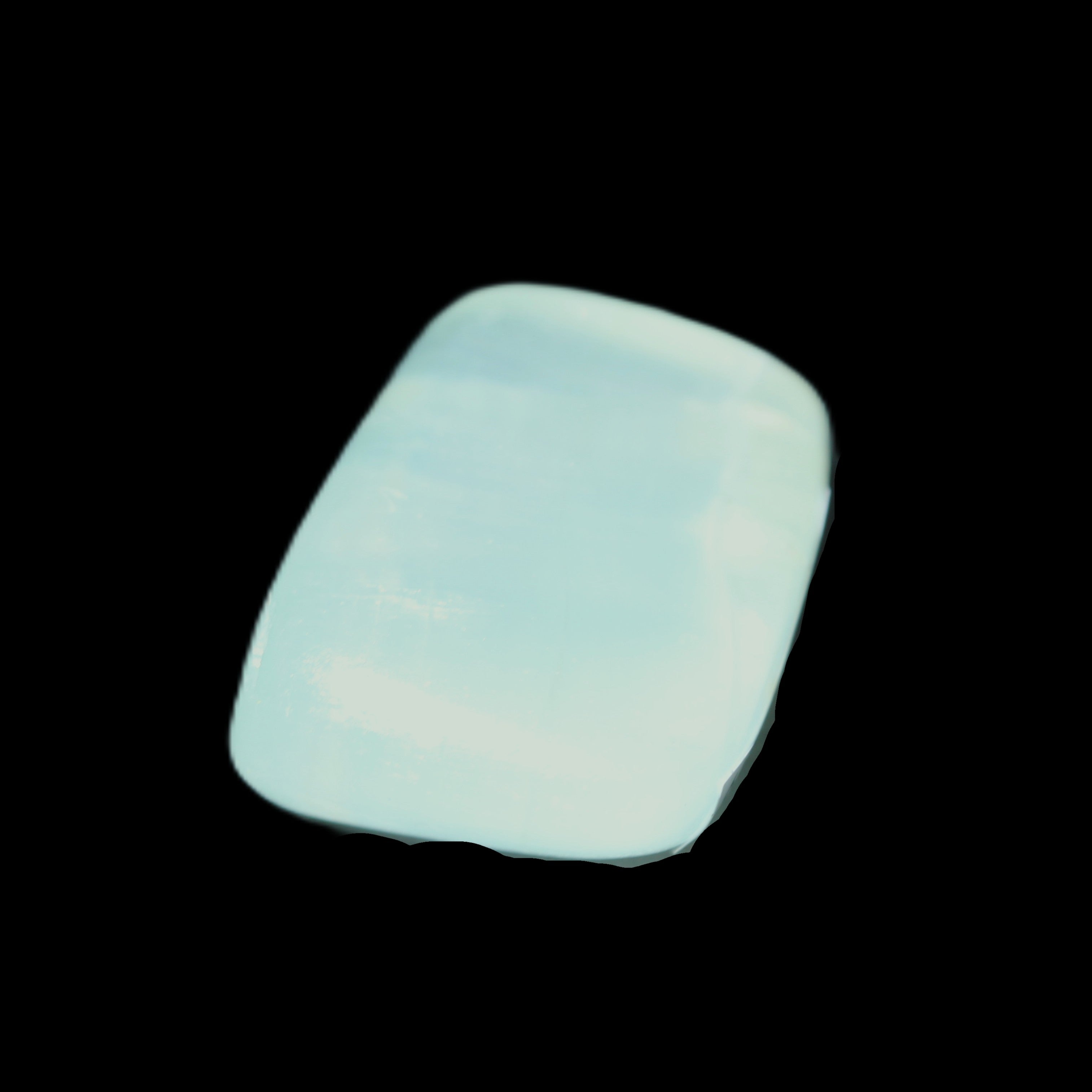 Pistachio Calcite tumbled stone 30-37mm 21-29g in sunlight - Rocks and Things Store