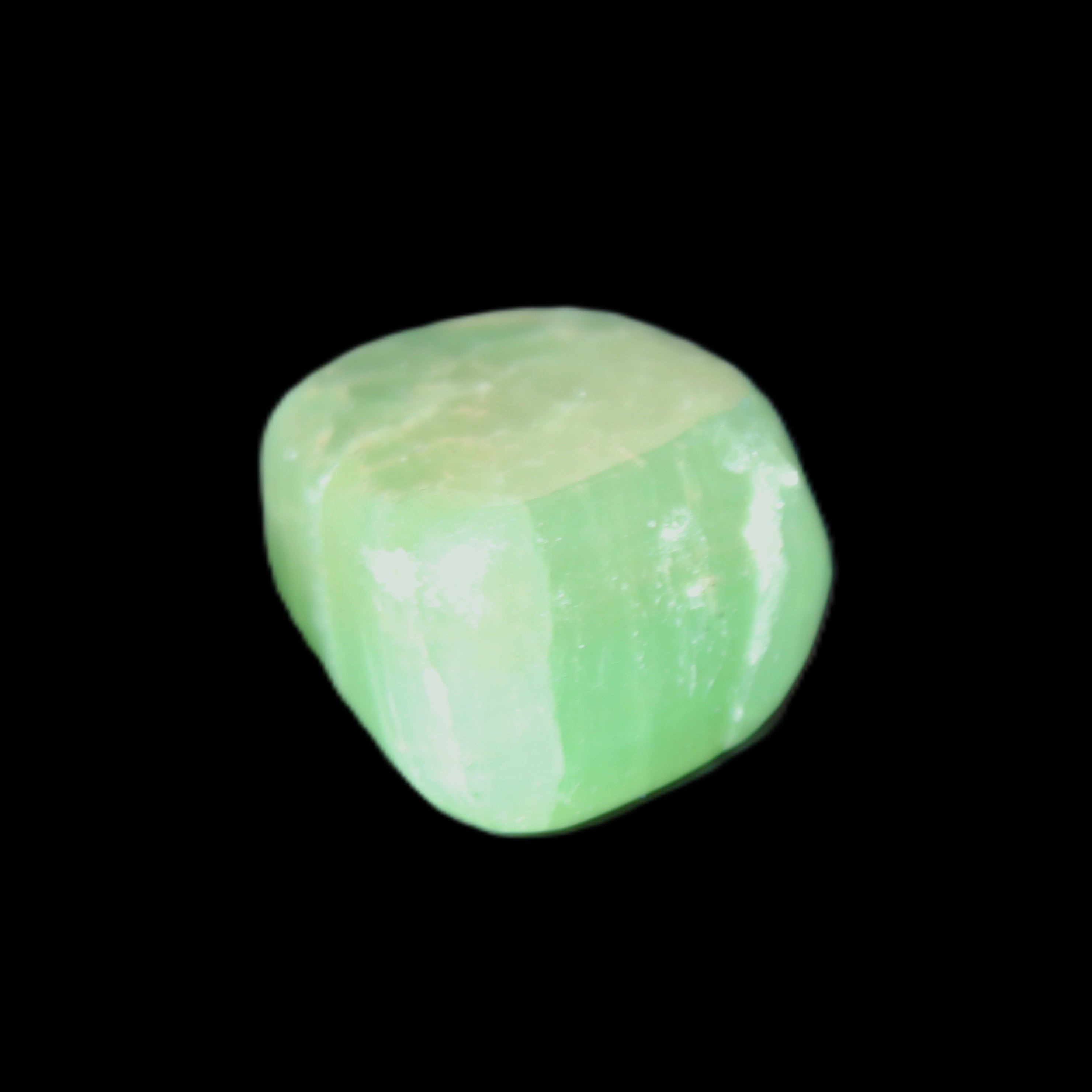 Green Aragonite tumbled stone 23*21*15mm 18g in sunlight - Rocks and Things Store