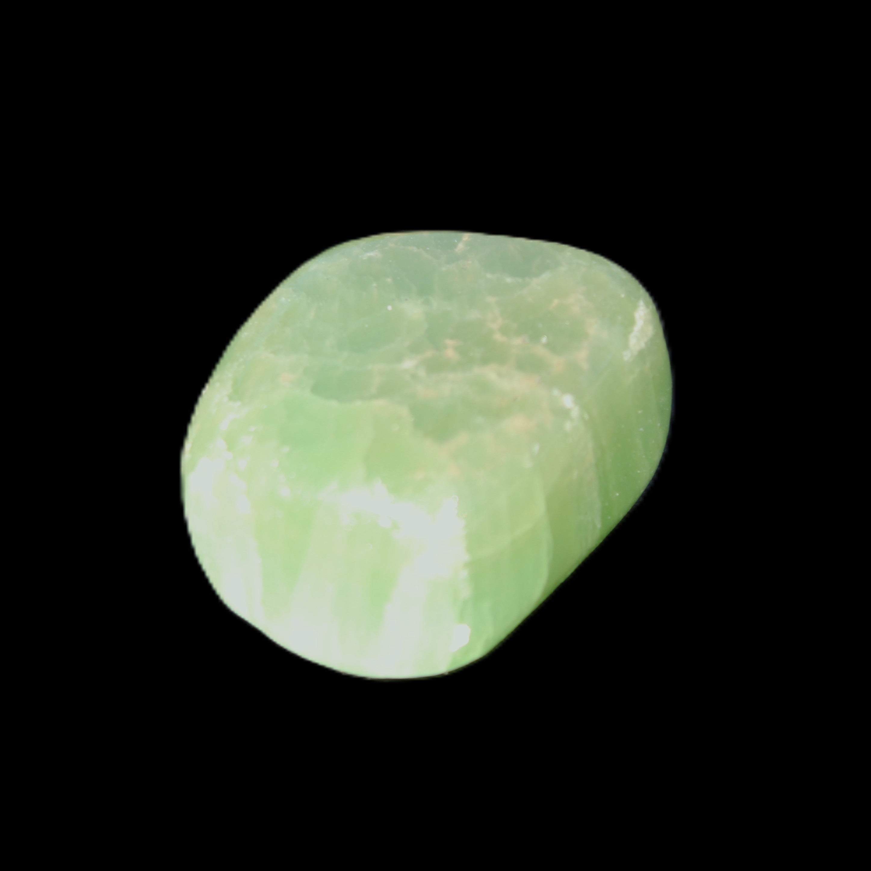 Green Aragonite tumbled stone 23*21*15mm 18g in sunlight - Rocks and Things Store