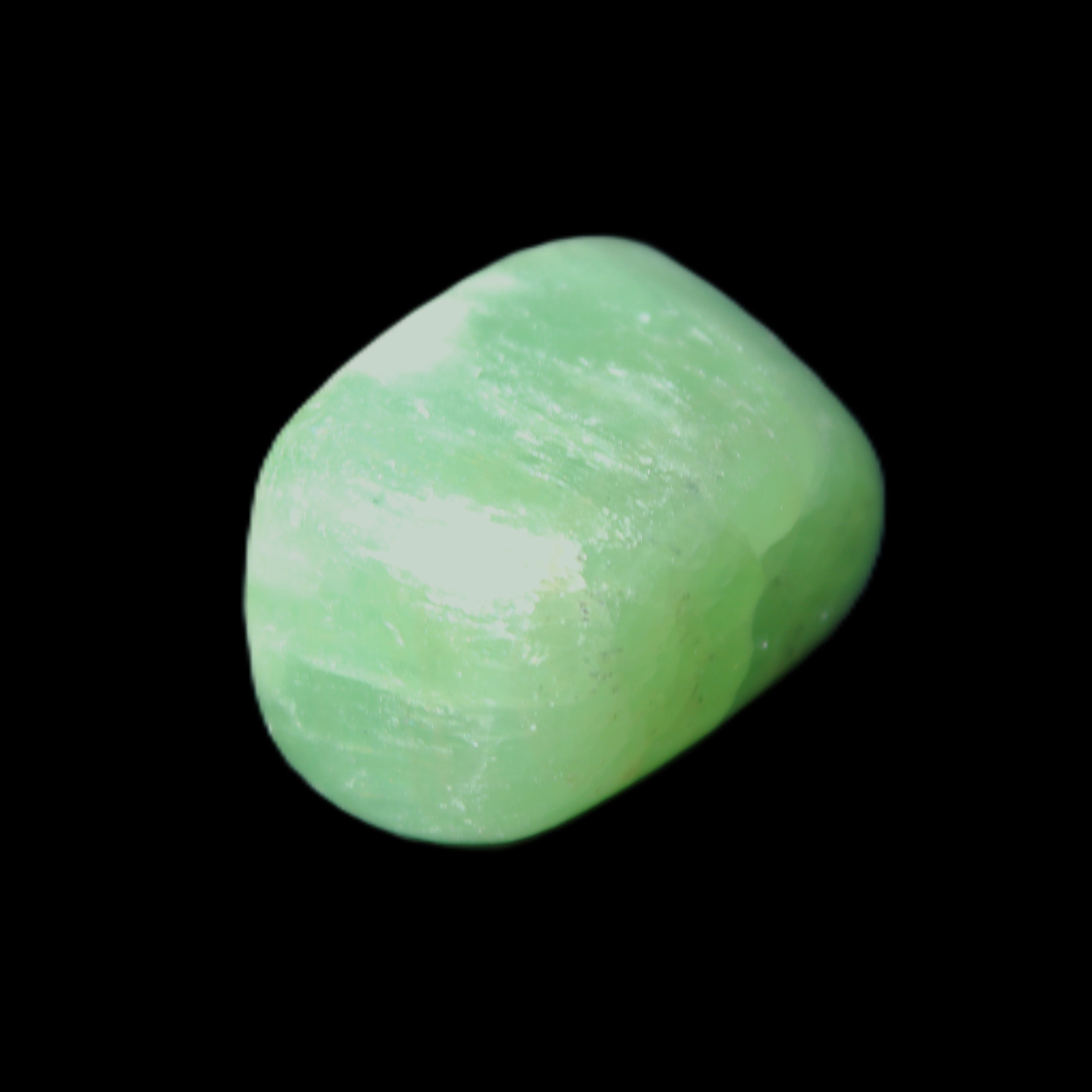 Green Aragonite tumbled stone 30mm 25-27g in sunlight - Rocks and Things Store