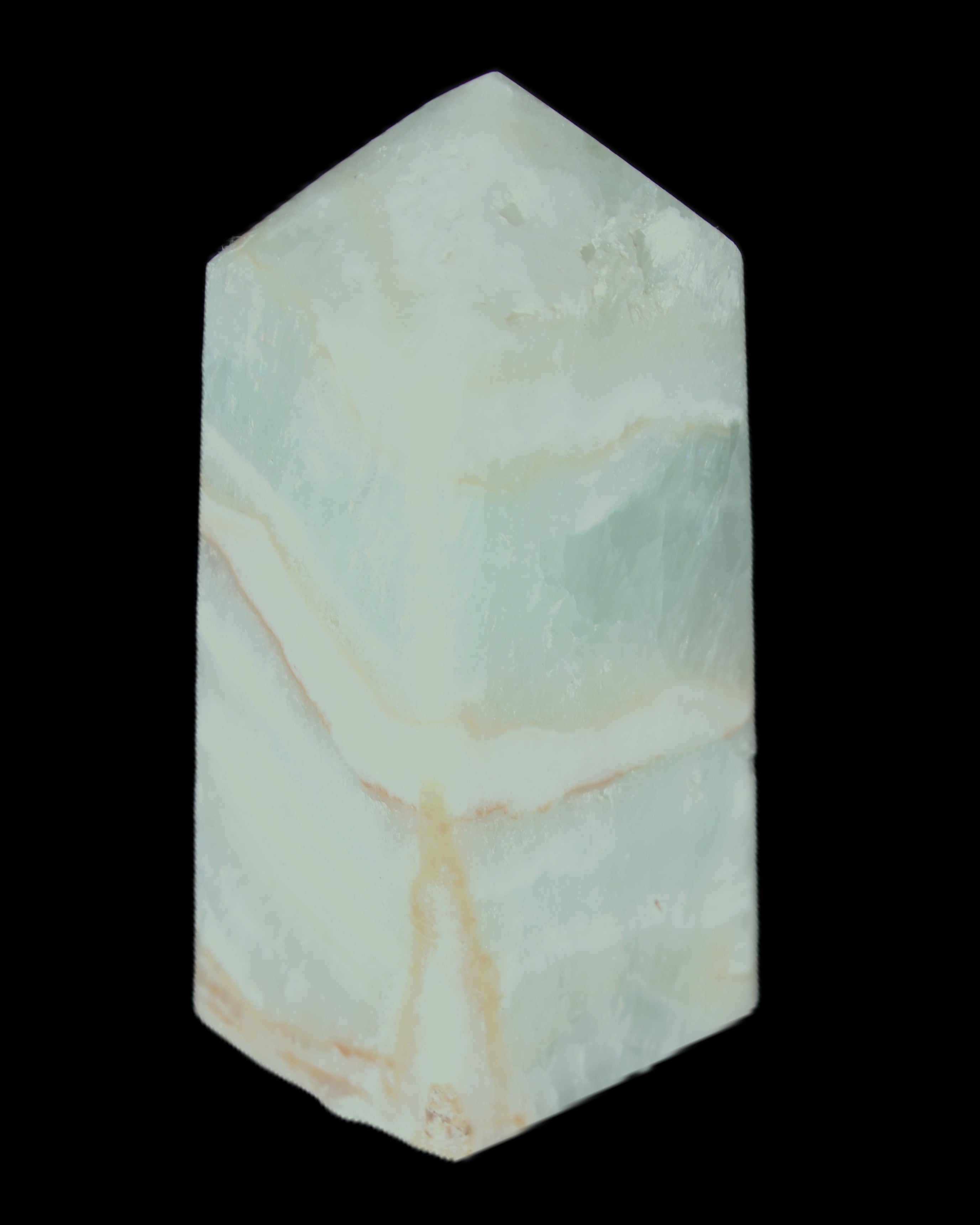 Pistachio Calcite obelisk 56*26*23mm 73g in sunlight - Rocks and Things Store