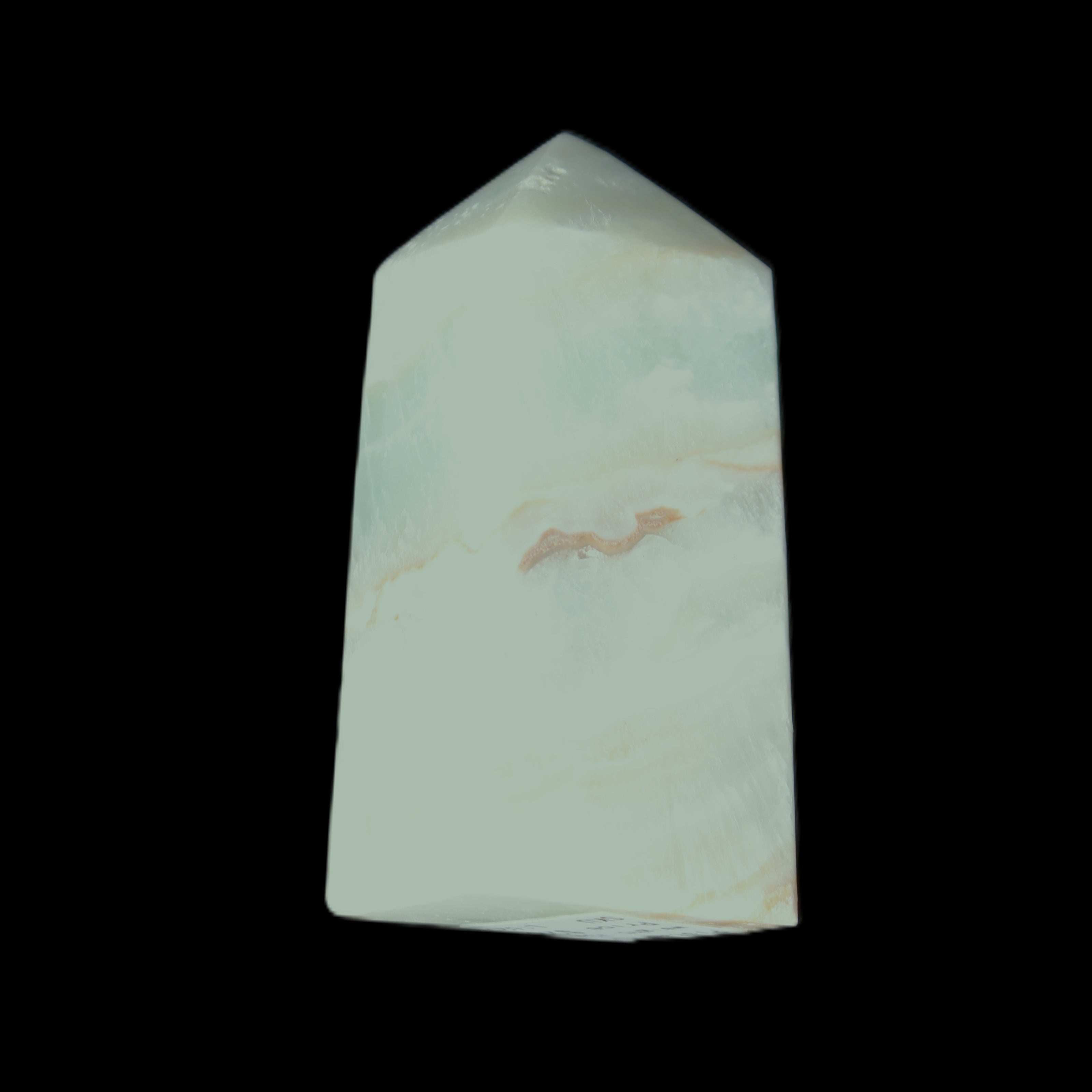 Pistachio Calcite obelisk 56*26*23mm 73g in sunlight - Rocks and Things Store