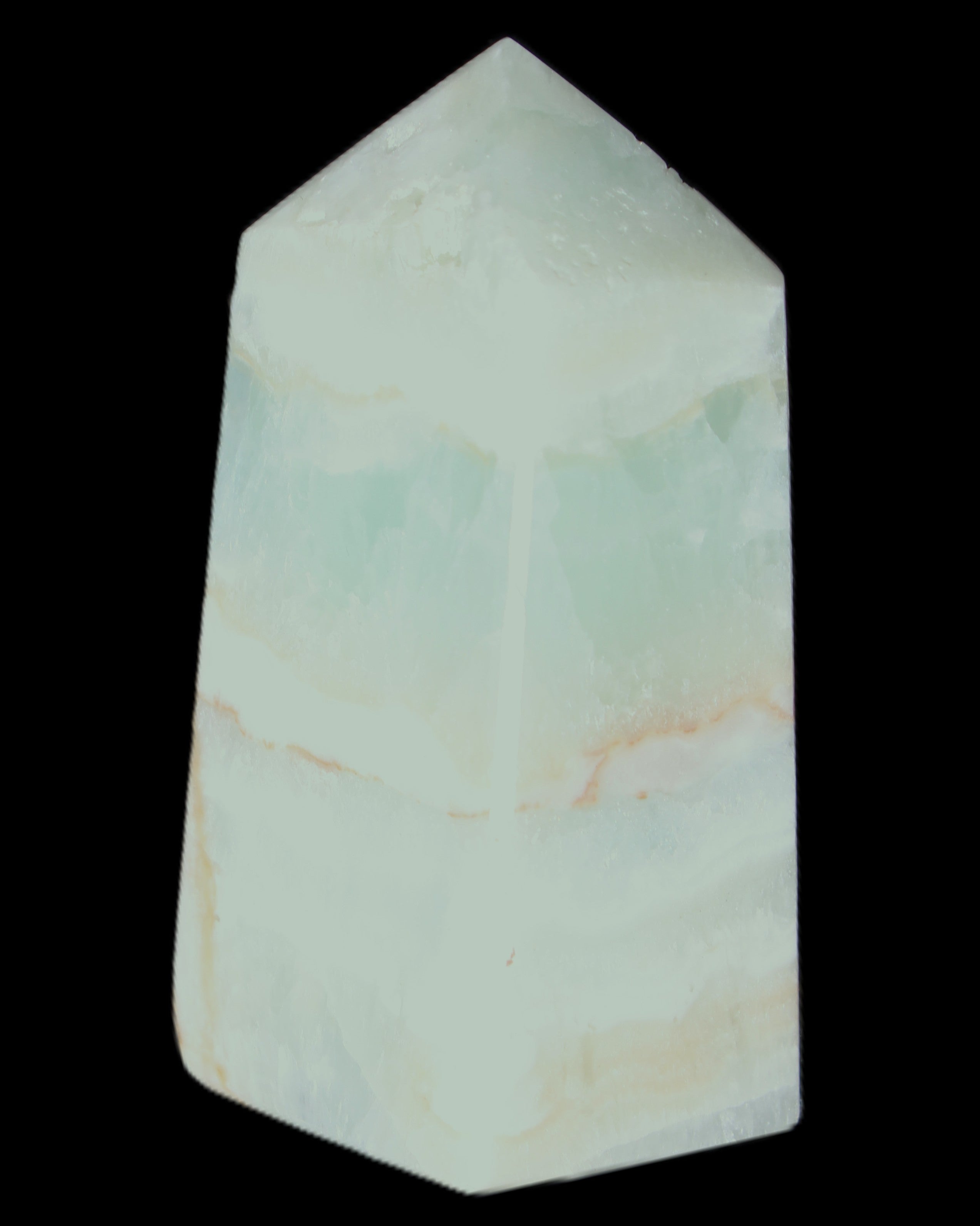 Pistachio Calcite obelisk 56*26*23mm 73g in sunlight - Rocks and Things Store
