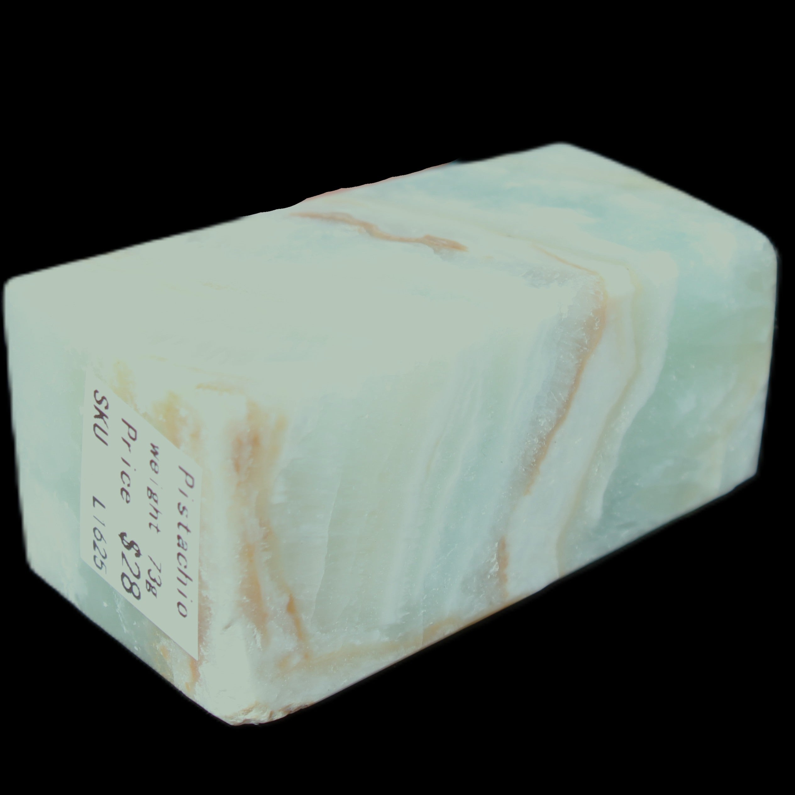 Pistachio Calcite obelisk 56*26*23mm 73g in sunlight - Rocks and Things Store