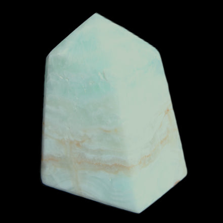 Pistachio Calcite obelisk 51*35*24mm 77g in sunlight - Rocks and Things Store