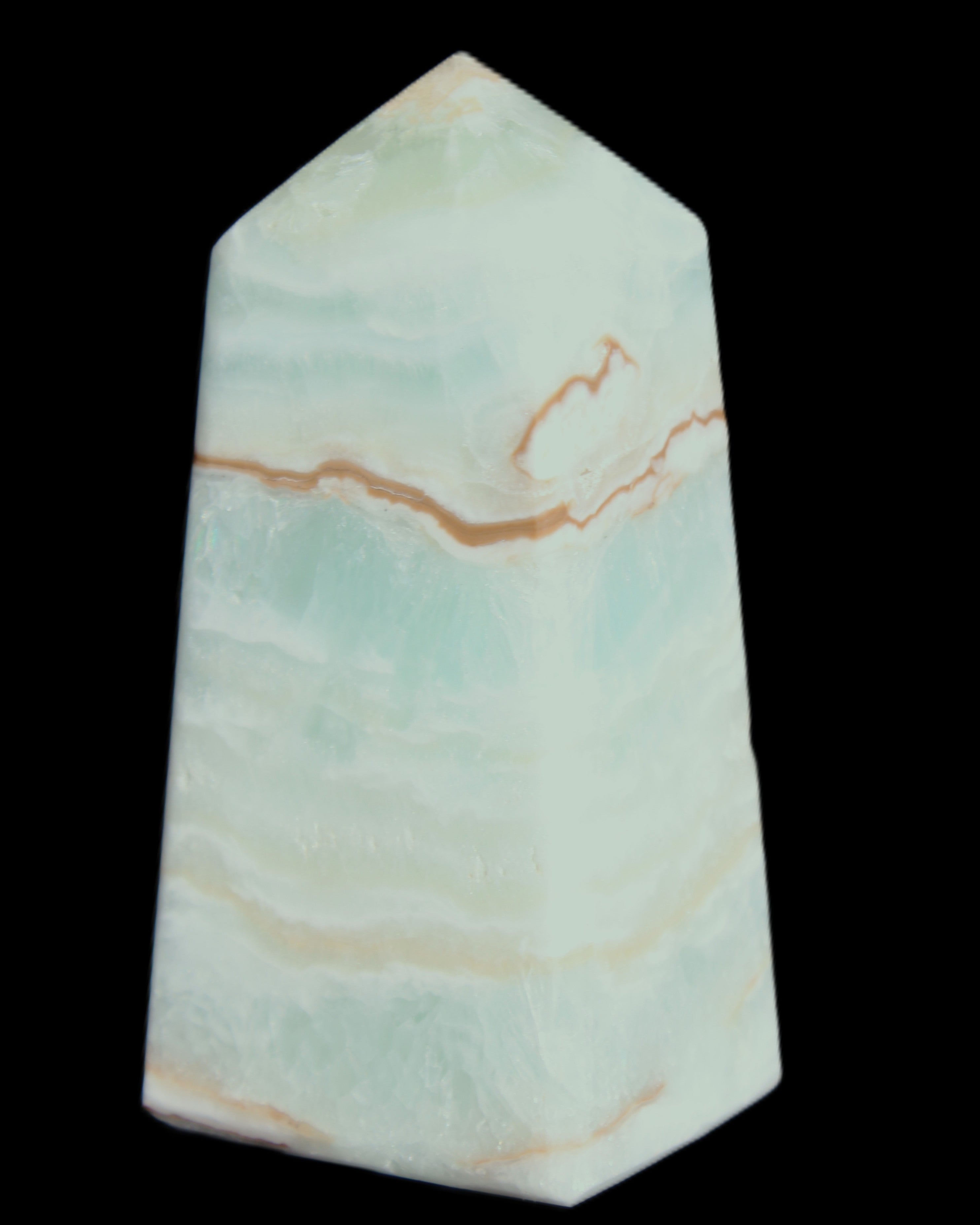 Pistachio Calcite obelisk 75*35*28mm 142g in sunlight - Rocks and Things Store