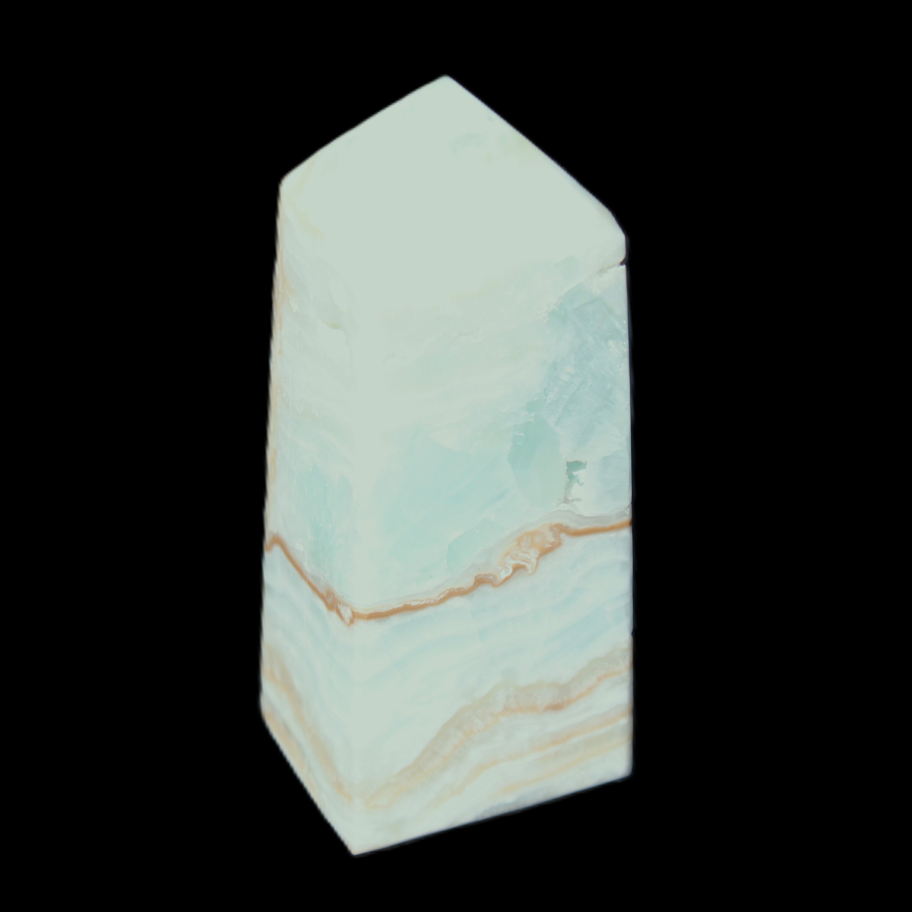 Pistachio Calcite obelisk 68*28*24mm 92g in sunlight - Rocks and Things Store