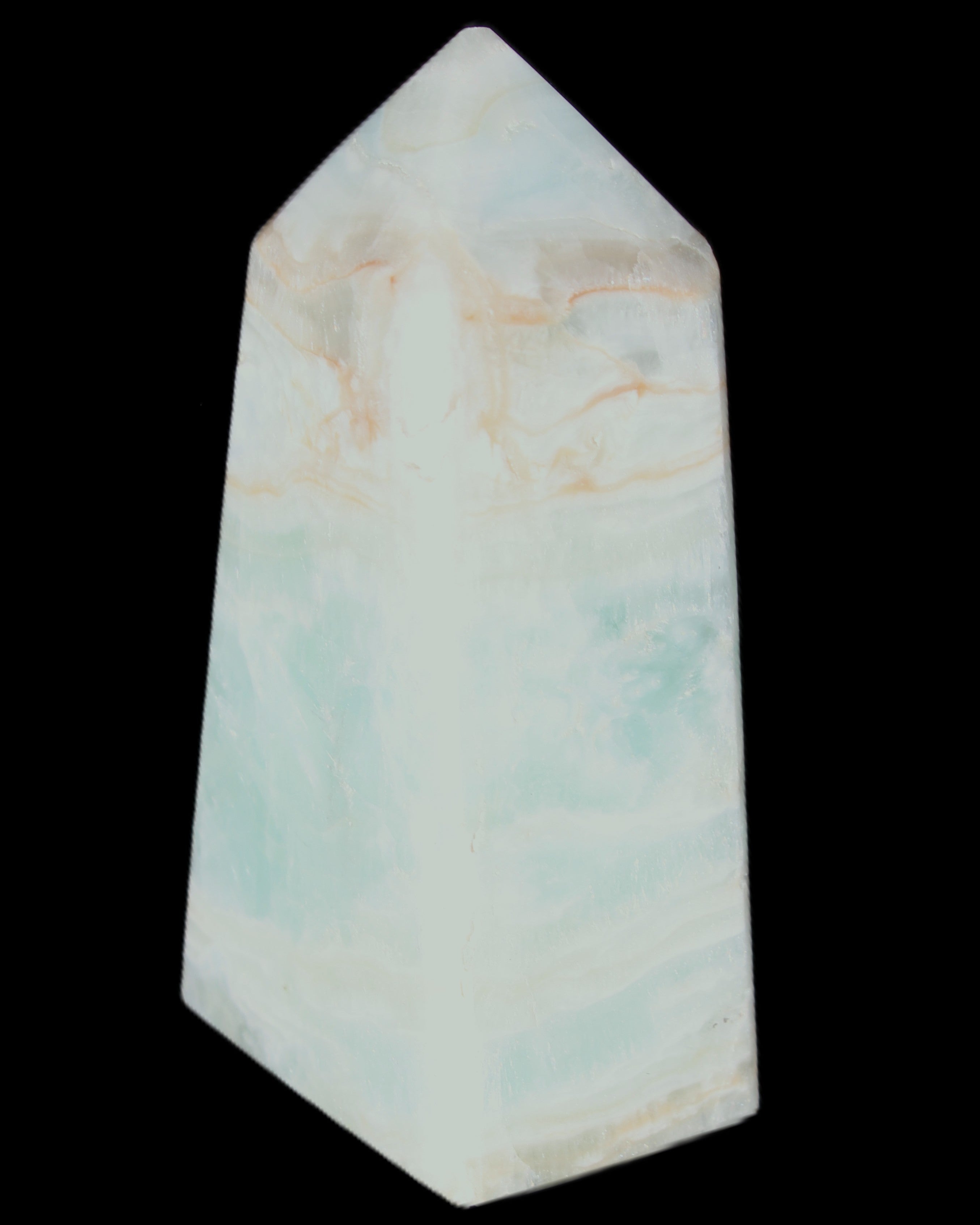 Pistachio Calcite obelisk 72*35*24mm 110g in sunlight - Rocks and Things Store