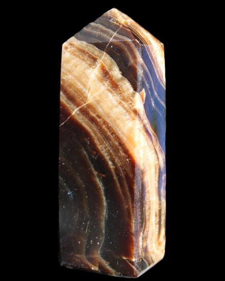 Chocolate Calcite obelisk 95*31*23mm 172g in sunlight - Rocks and Things Store