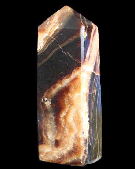Chocolate Calcite obelisk 95*31*23mm 172g in sunlight - Rocks and Things Store