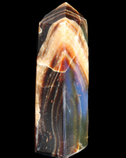 Chocolate Calcite obelisk 95*31*23mm 172g in sunlight - Rocks and Things Store