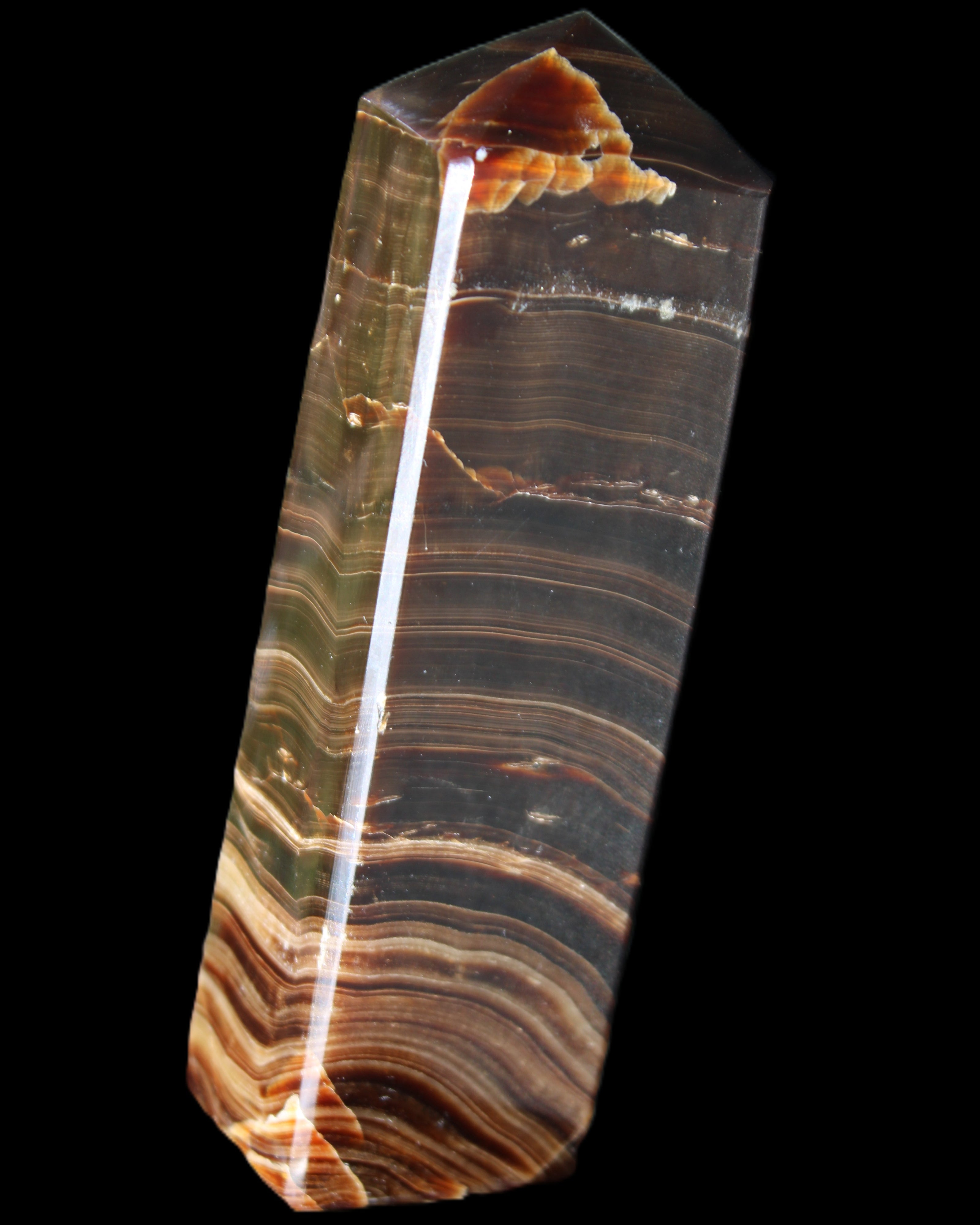 Chocolate Calcite obelisk 114*33*26mm 249g in sunlight - Rocks and Things Store