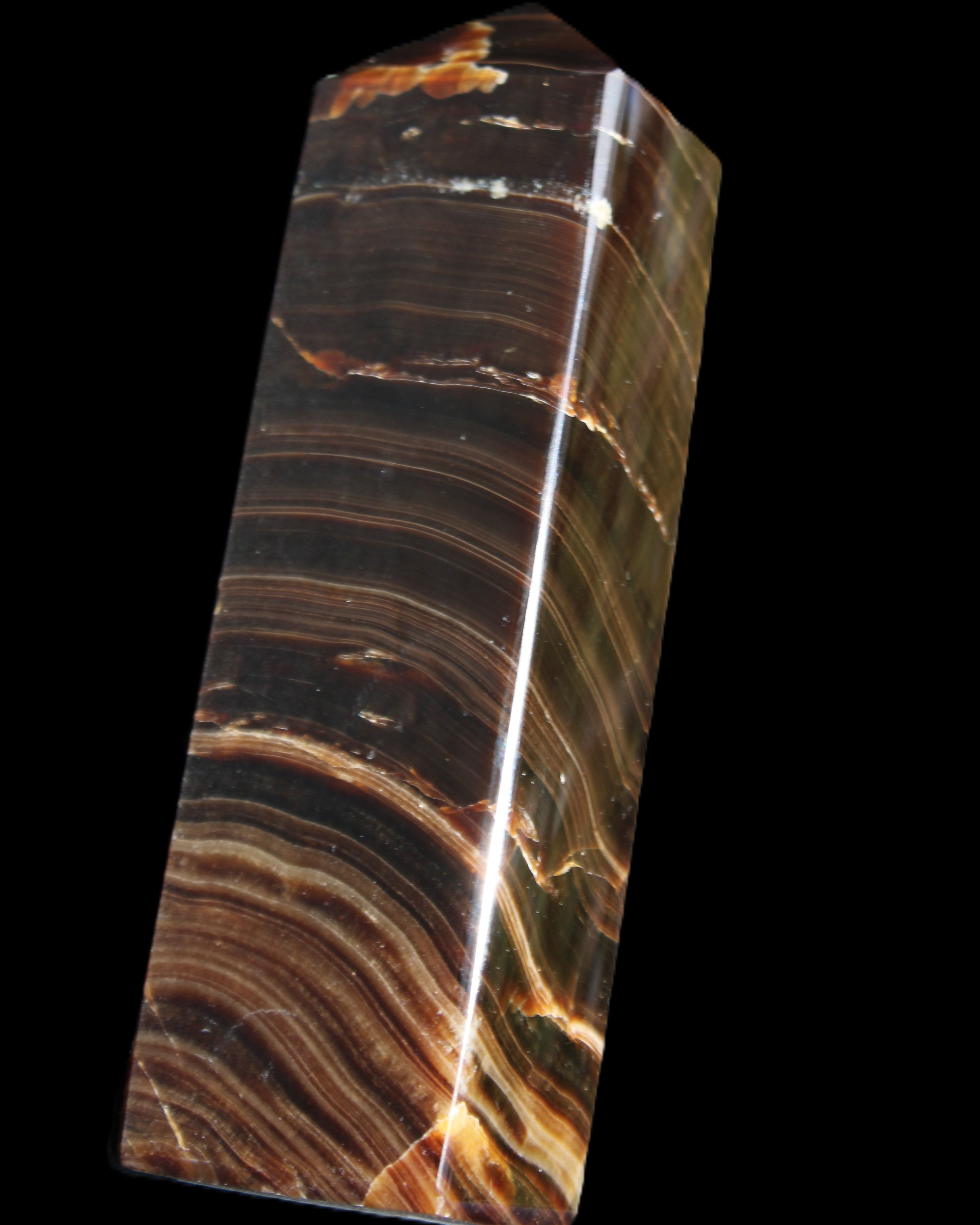 Chocolate Calcite obelisk 114*33*26mm 249g in sunlight - Rocks and Things Store