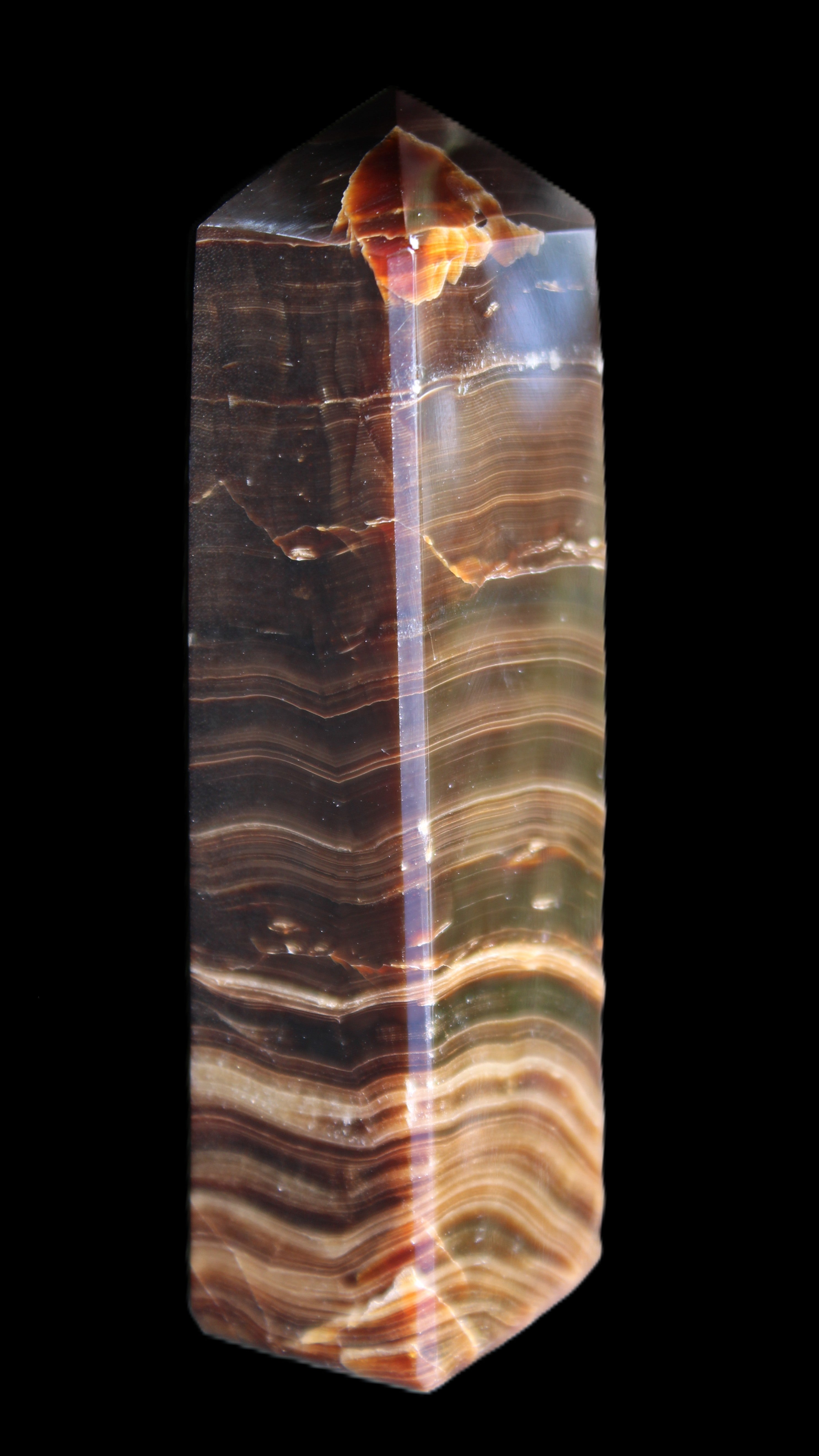 Chocolate Calcite obelisk 114*33*26mm 249g in sunlight - Rocks and Things Store