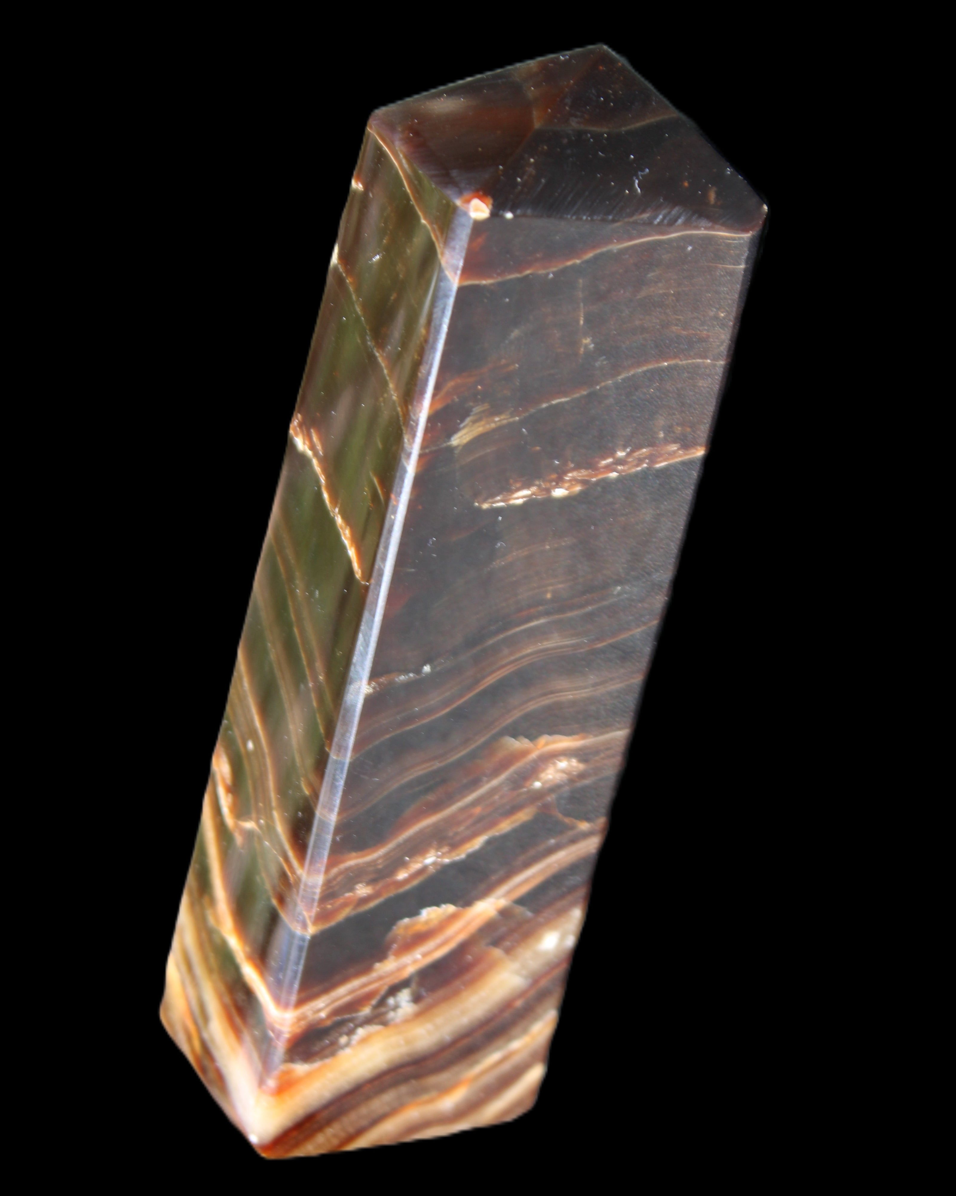 Chocolate Calcite obelisk 114*33*26mm 249g in sunlight - Rocks and Things Store