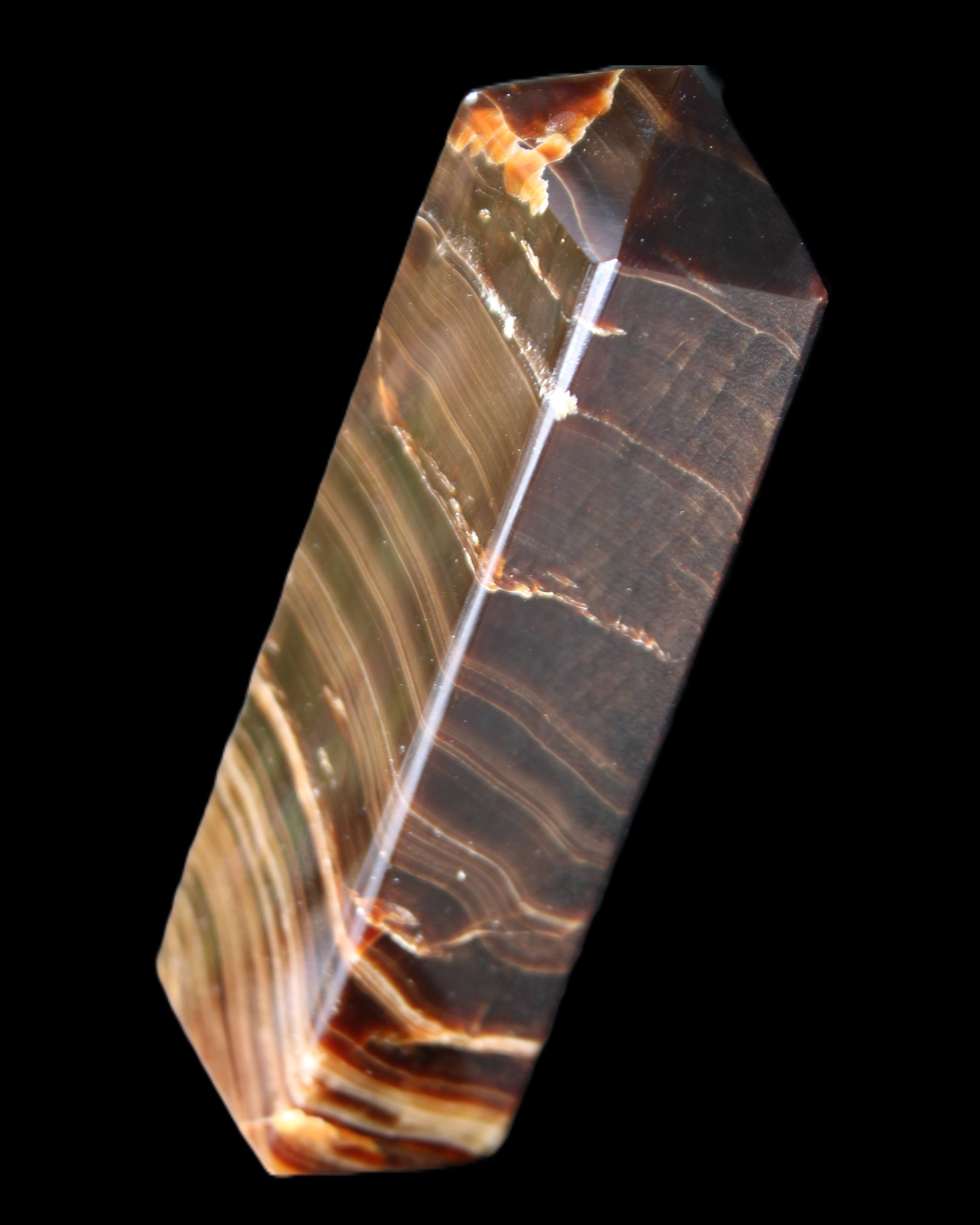 Chocolate Calcite obelisk 114*33*26mm 249g in sunlight - Rocks and Things Store