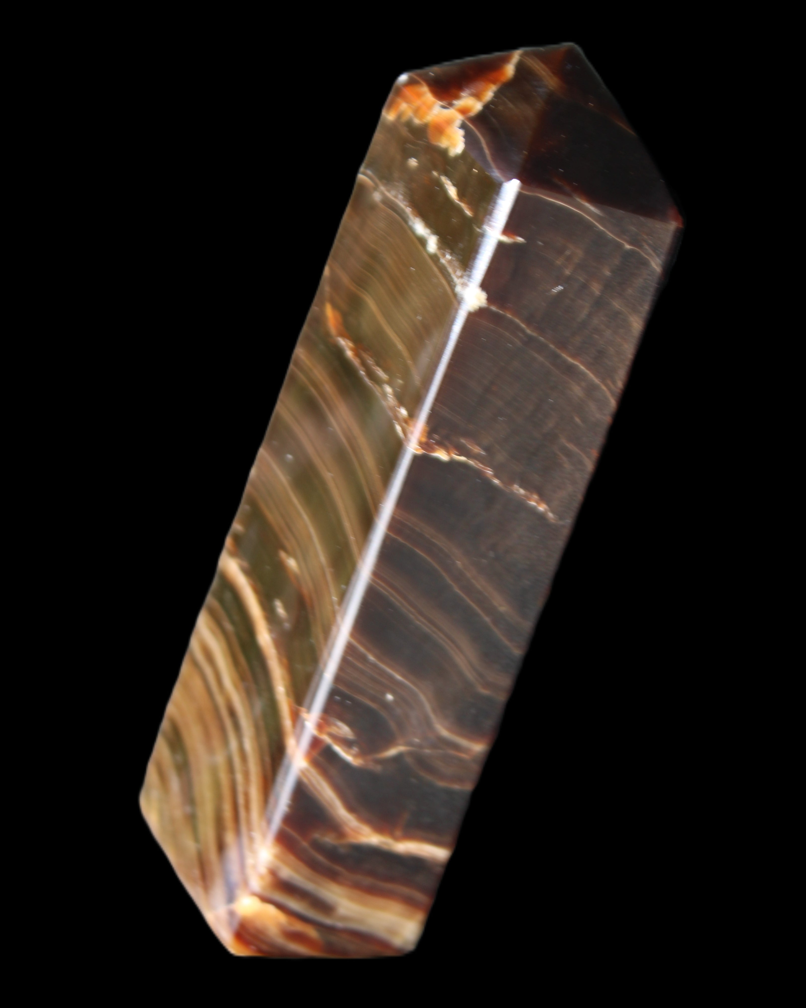 Chocolate Calcite obelisk 114*33*26mm 249g in sunlight - Rocks and Things Store