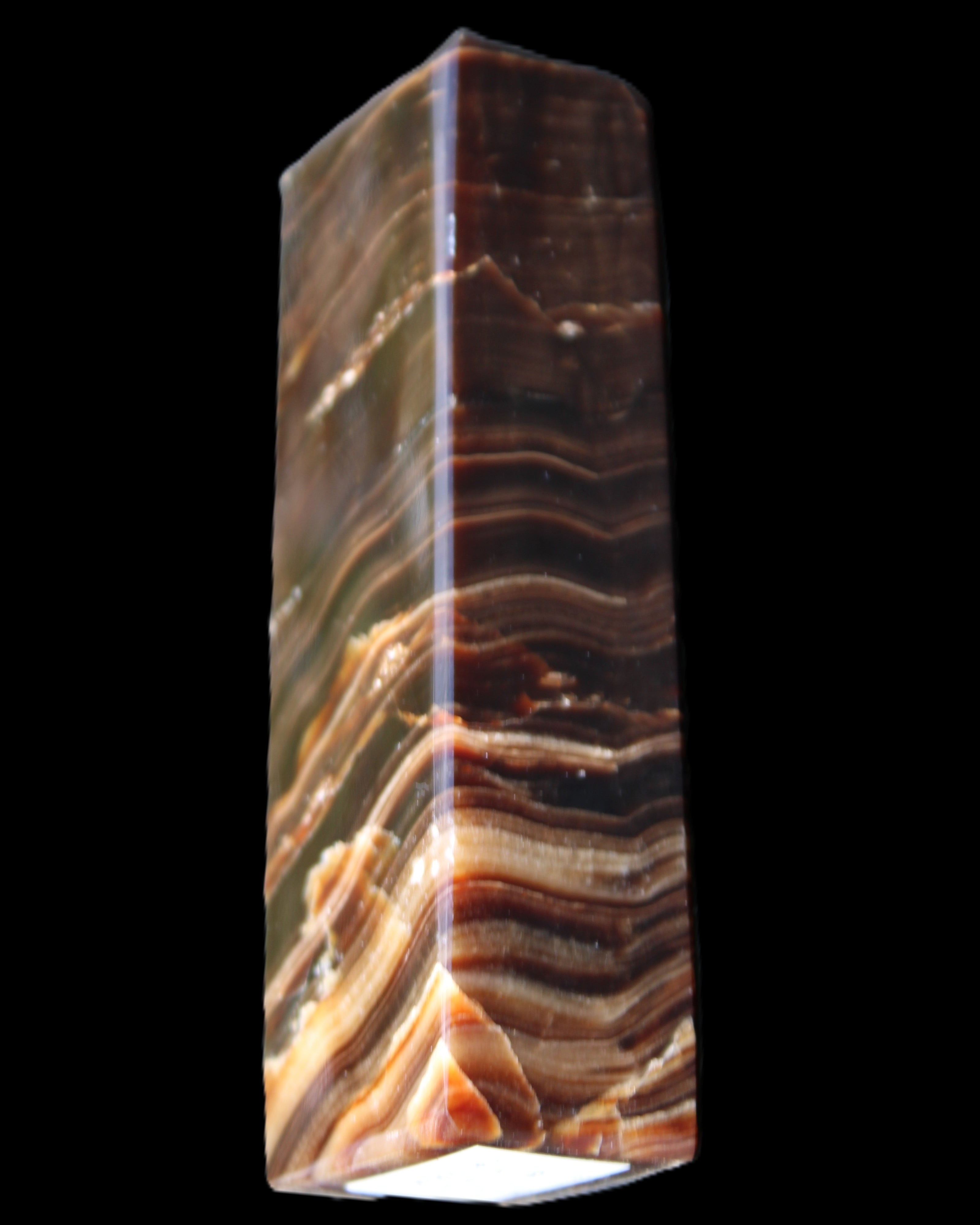 Chocolate Calcite obelisk 114*33*26mm 249g in sunlight - Rocks and Things Store