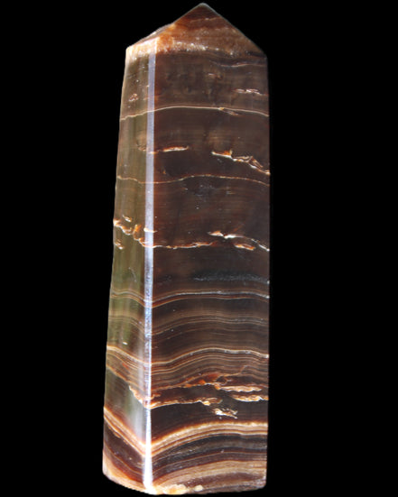 Chocolate Calcite obelisk 110*30*24mm 214g in sunlight - Rocks and Things Store