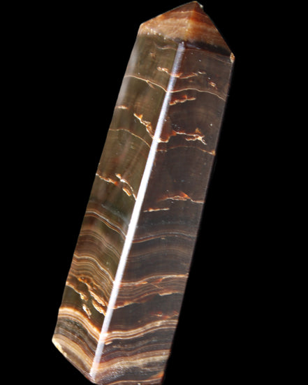 Chocolate Calcite obelisk 110*30*24mm 214g in sunlight - Rocks and Things Store
