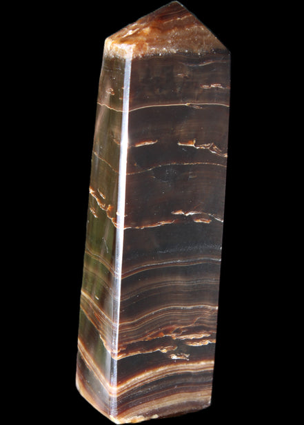 Chocolate Calcite obelisk 110*30*24mm 214g in sunlight - Rocks and Things Store