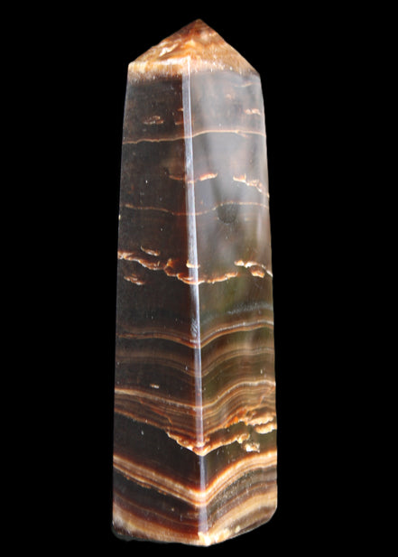 Chocolate Calcite obelisk 110*30*24mm 214g in sunlight - Rocks and Things Store
