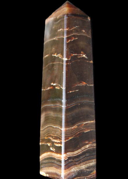 Chocolate Calcite obelisk 110*30*24mm 214g in sunlight - Rocks and Things Store