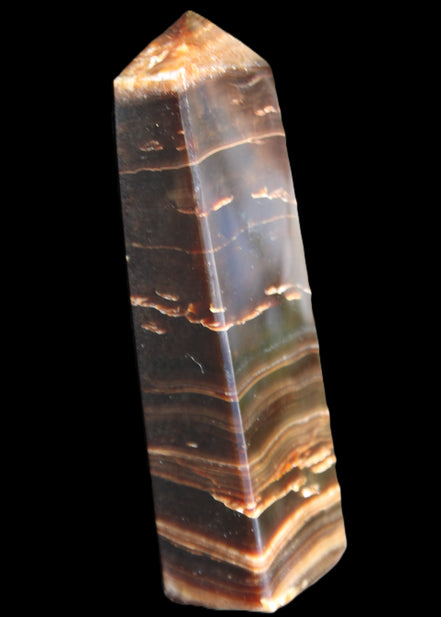 Chocolate Calcite obelisk 110*30*24mm 214g in sunlight - Rocks and Things Store