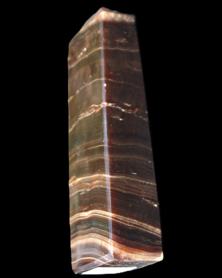 Chocolate Calcite obelisk 110*30*24mm 214g in sunlight - Rocks and Things Store