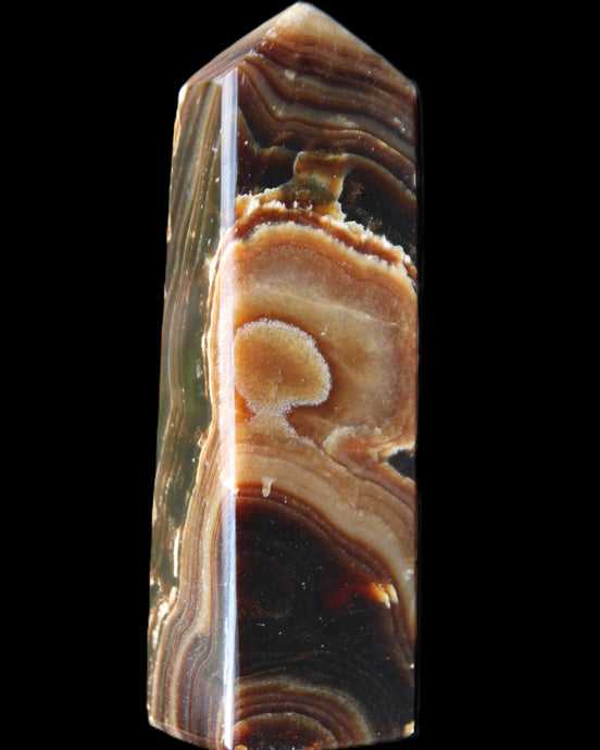 Chocolate Calcite obelisk 118*33*28mm 236g in sunlight - Rocks and Things Store