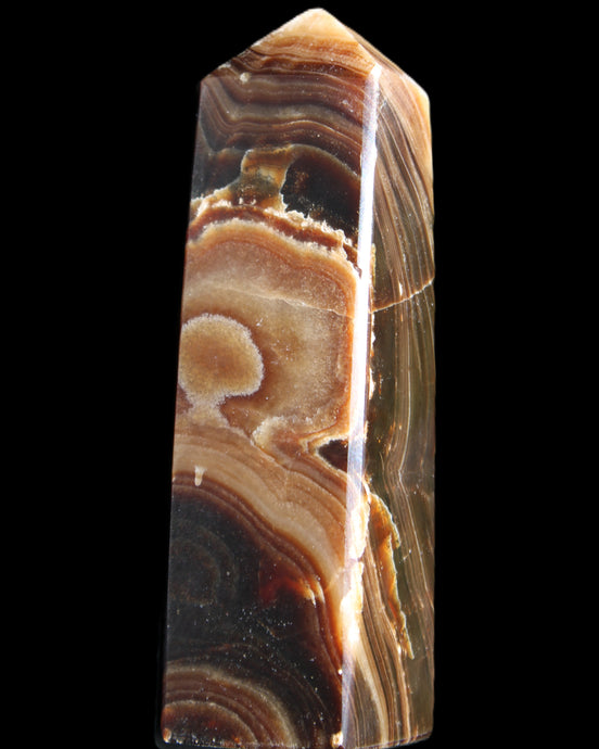 Chocolate Calcite obelisk 118*33*28mm 236g in sunlight - Rocks and Things Store