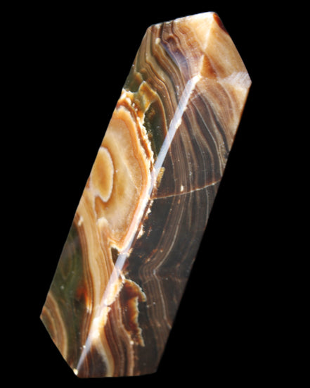 Chocolate Calcite obelisk 118*33*28mm 236g in sunlight - Rocks and Things Store
